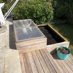 2 raised beds and pots for the family vegetables